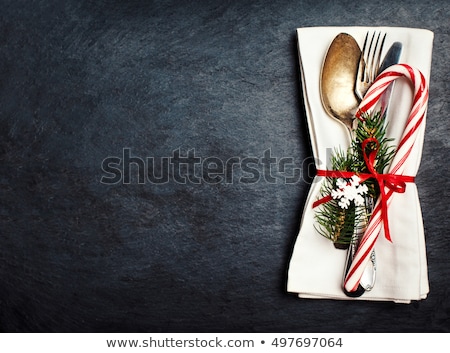 Foto d'archivio: Christmas Table Setting Over White