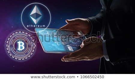 Stock fotó: Close Up Of Businessman With Bitcoin Hologram