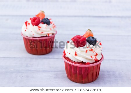 [[stock_photo]]: Chocolate Cupcake With Cream Ganache And Strawberry