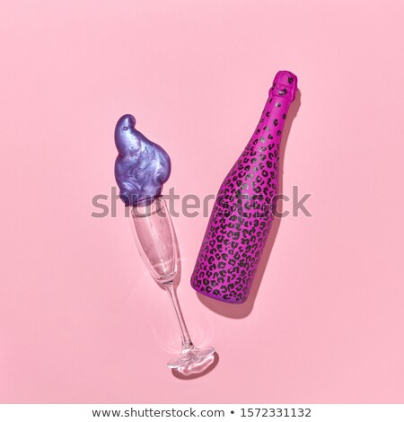 ストックフォト: Decorative Painted Bottle With Glass And Paint Spot On A Pink