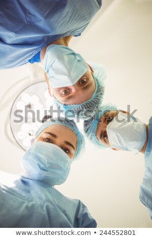ストックフォト: Portrait Of A Caucasian Female Surgeon Looking At The Camera With An Operation Mask In The Operation