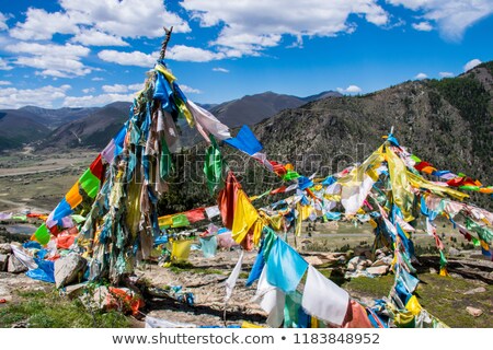 Stock photo: Golden Buddha Sculpture In Tibetan Monastery Over Blue Sky