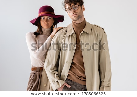 Zdjęcia stock: Woman In Trench Coat And A Man