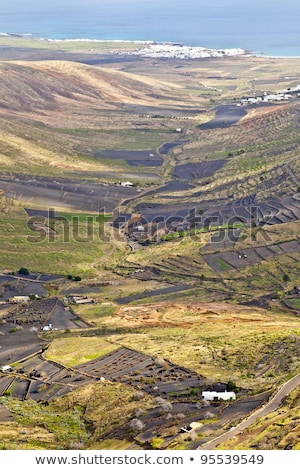 Foto stock: Landscape Lanzarote Small Town With Terrace Cultivation