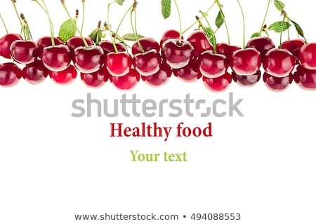 ストックフォト: Bunches Of Ripe Cherries With Leaves On A White Background Isolated Decorative Fruit Border Copy
