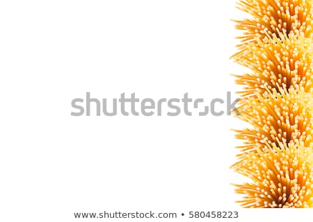 Foto d'archivio: Decorative Border Of Sheaf Italian Spaghetti With Copy Space Top View Isolated On White Background