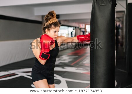 Zdjęcia stock: Concentrated Young Strong Sports Lady Boxer
