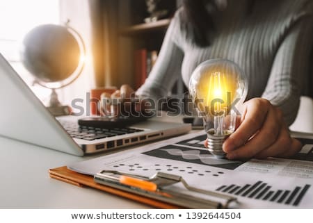 Stock fotó: Woman With Light Bulb