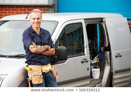 Stock photo: Plumber Standing With Van Smiling