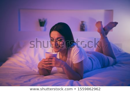 Сток-фото: Close Up Of Woman With Sweets And Drink In Bed