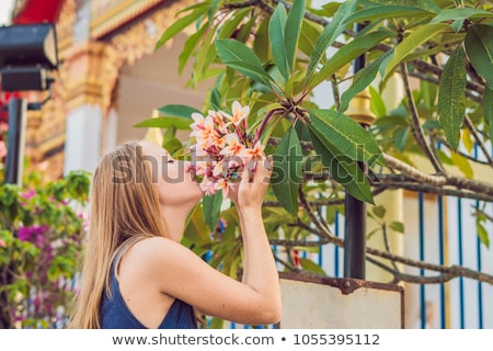 Stockfoto: Young Woman Tourist In Thai Temple In Phuket Town Wat Mongkolnimit