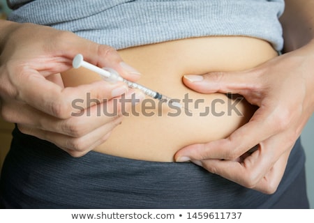 Stock fotó: Diabetic Woman Injecting On Stomach