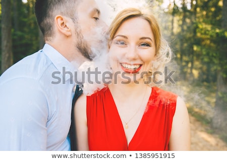 Stockfoto: Foolish Businessman In Love With Kisses On His Face
