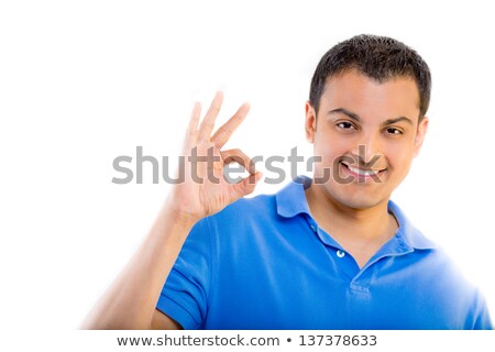 Stock photo: A Handsome Executive Telling You Everything Is Okay While Isolat
