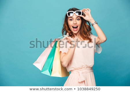 Stockfoto: Beautiful Woman Holding Shopping Bags