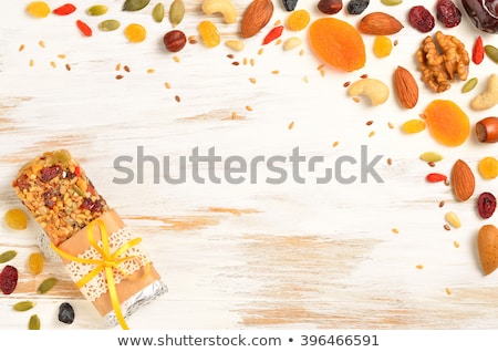 Stock photo: Granola Bars With Dried Fruits Wooden Background