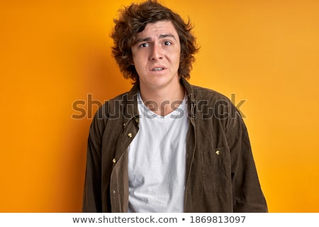 Foto stock: Irritated Man In Misunderstanding Looking At Camera