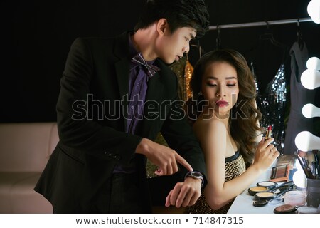 ストックフォト: Asian Man Waiting For Girlfriend