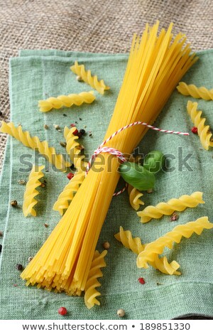 [[stock_photo]]: Uncooked Gluten Free Pasta From Blend Of Corn And Rice Flour