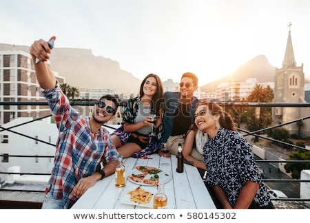 Сток-фото: Happy Friends Taking Selfie At Rooftop Party