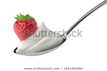 Zdjęcia stock: Closeup Of A Raspberry On A Spoon With Yogurt