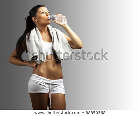 ストックフォト: Young Brunette Woman Wearing Sports Clothes