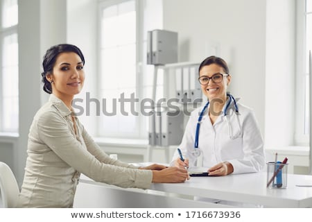 Stok fotoğraf: Psychiatrist Examining A Female Patient