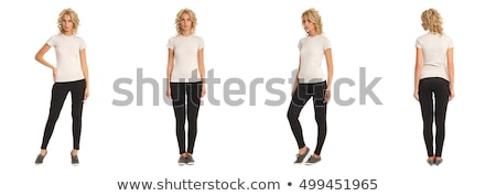 Stock fotó: Young Beautiful Woman In A Black Leggings Isolated