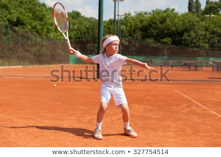 Stock fotó: Boy In Tennis Lesson