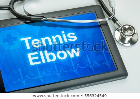 Stock fotó: Tablet With The Diagnosis Tennis Elbow On The Display