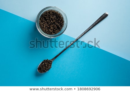 Foto d'archivio: Black Caviar With Spoon Fish Caviar Delicacy Meal