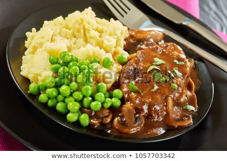 Foto d'archivio: Cutlets With Peas
