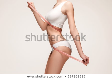 Foto stock: Ella · mujer · con · cinta · métrica