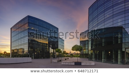 Imagine de stoc: Facade Of Office Building By Night