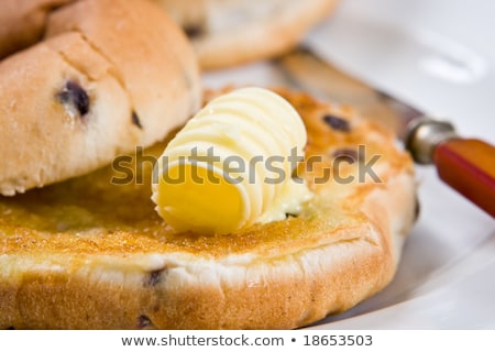 Foto stock: Erca · de · un · delicioso · pastel · de · té · caliente · con · mantequilla · derretida