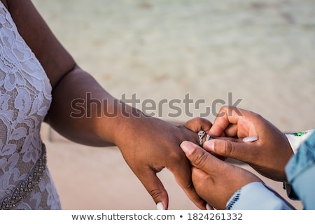 Foto d'archivio: Close Up Of Lesbian Couple Hands And Wedding Rings