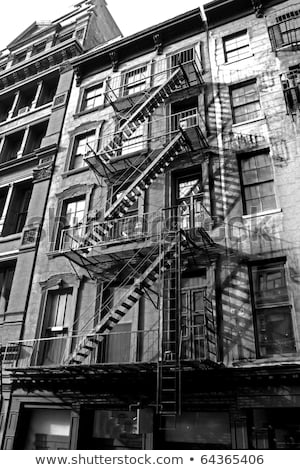 Foto d'archivio: Old Buildings With Fire Stairs In New York