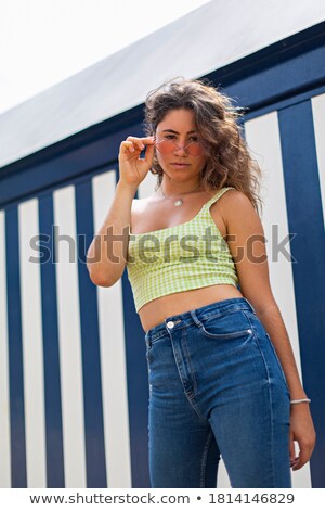 Foto d'archivio: Girl In Front Of Beach Hut