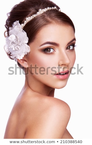 Zdjęcia stock: Brunette Beauty Posing With A Flower