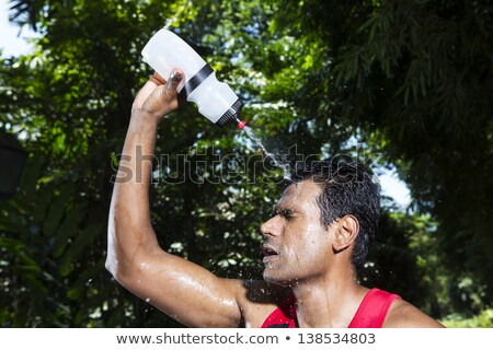 Stock foto: Athlete Drinking Water After Physical Effort