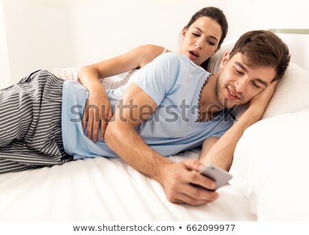 Stock photo: Upset Couple With Marital Problems In Bed