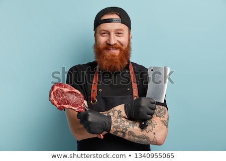 Stok fotoğraf: Male Chef Holding Meat Cleaver And Knife