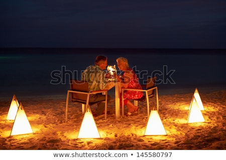 Zdjęcia stock: Senior Couple Enjoying Late Meal In Outdoor Restaurant