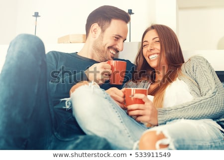 Foto stock: Affectionate Couple On Sofa