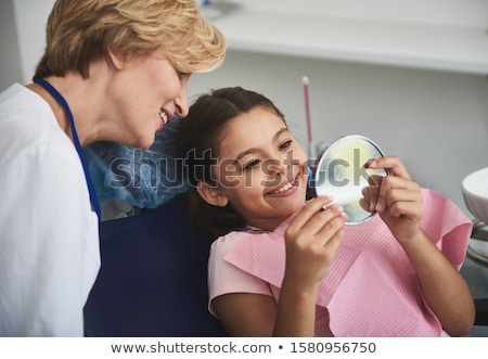 Stock foto: The Little Girl Visiting Doctor For Regular Check Up