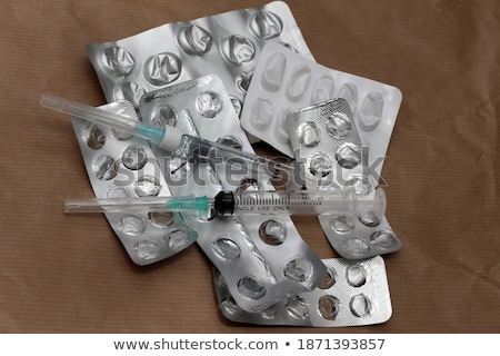 Stock photo: Pile Of Used Syringes