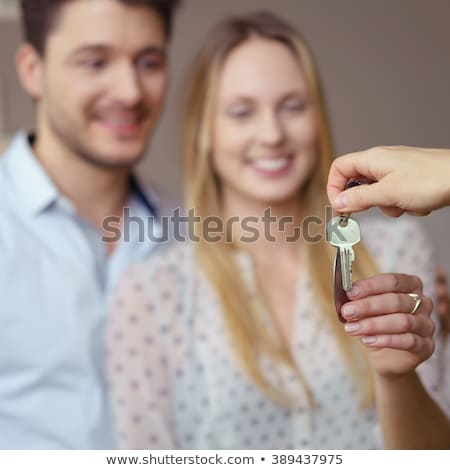 ストックフォト: Man Handing Over The Set Of Keys House