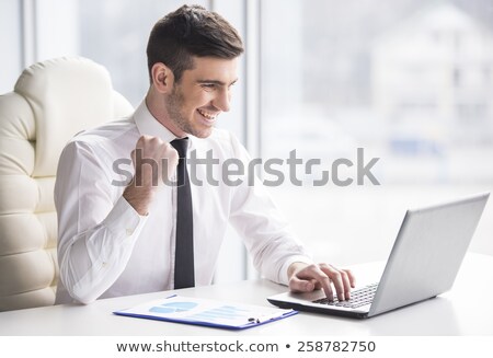 Сток-фото: Portrait Of An Adult Business Man Sitting In The Office And Dayd