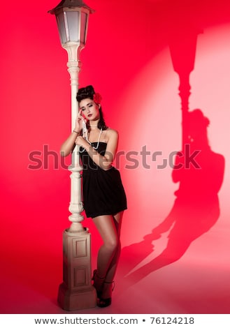 Young Woman And Lightpole Stock fotó © clearviewstock