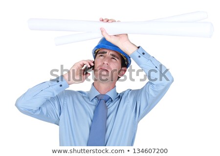 Foto stock: Architect Receiving Bad News Over The Phone